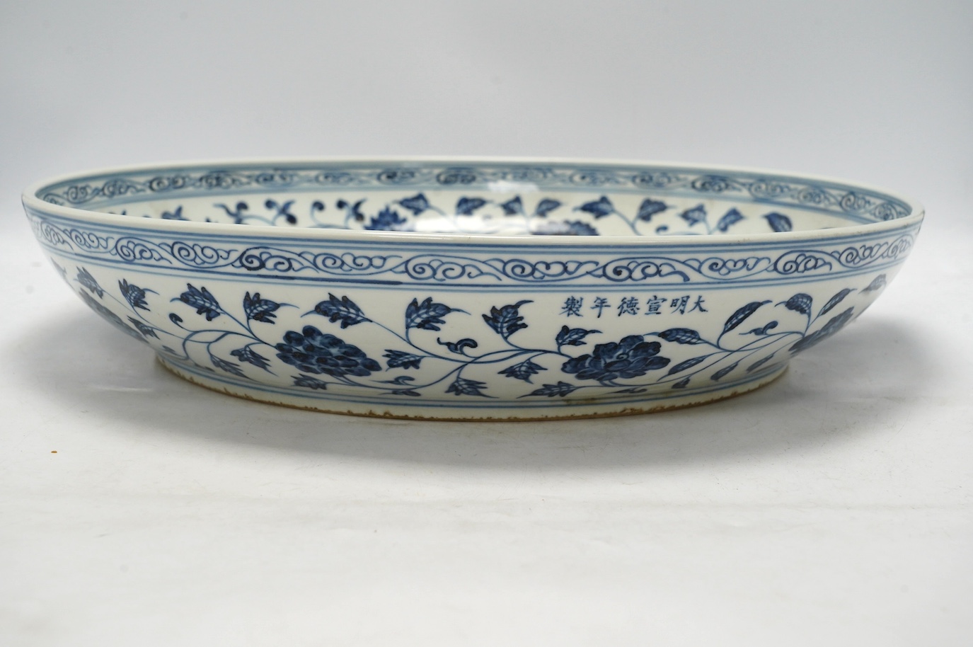 A large Chinese Ming style charger, 45cm diameter. Condition - good